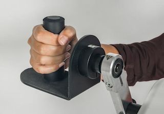 Vertical hand grip with hand rest